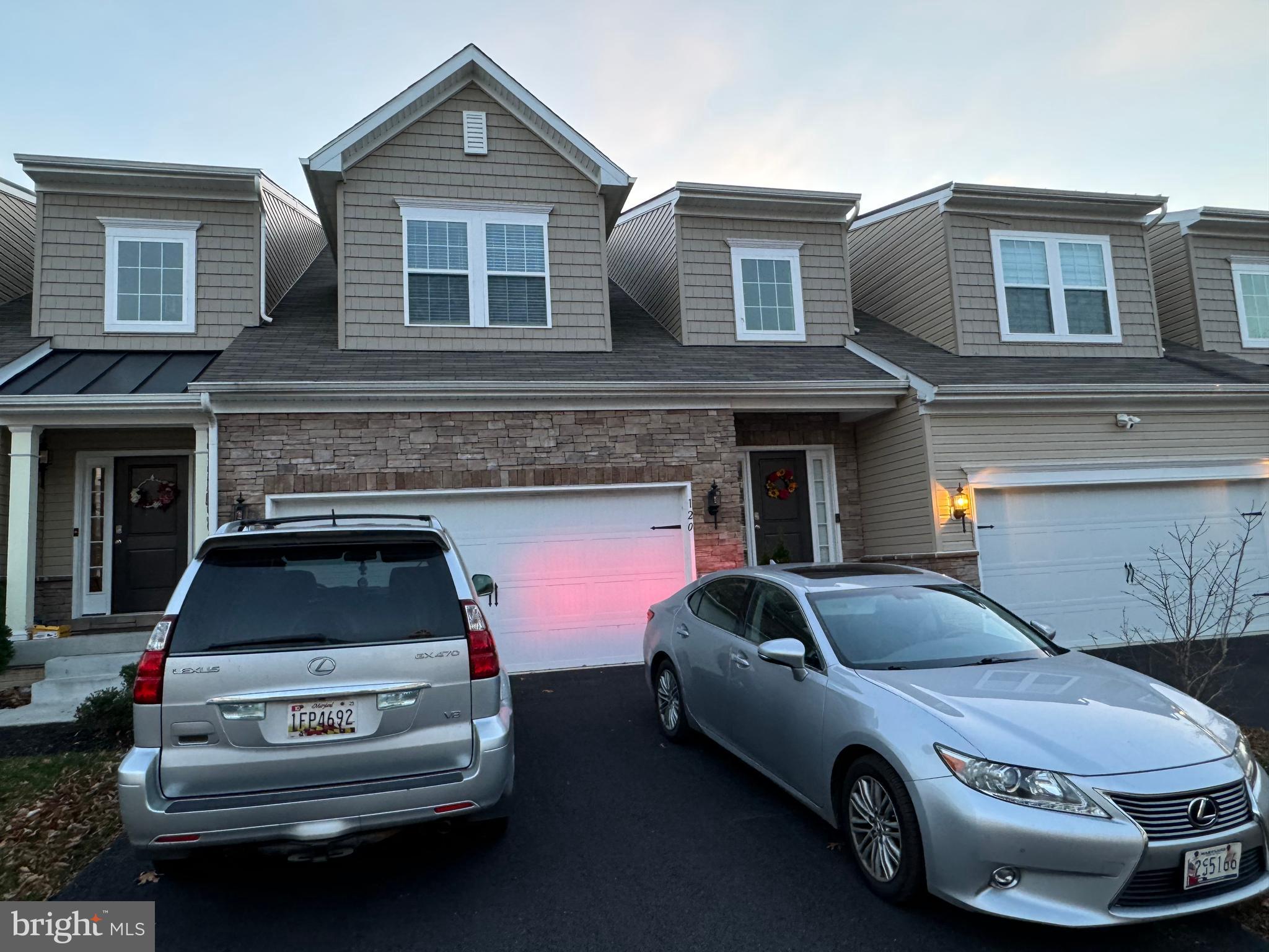 a car parked in front of a house