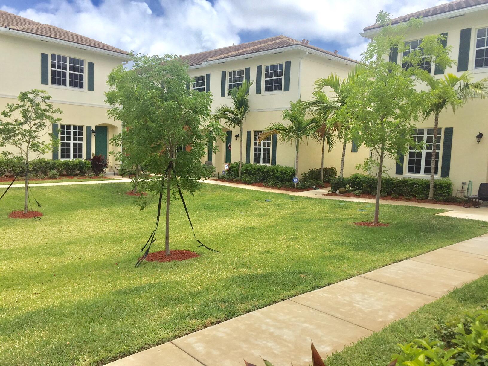 a house view with a garden space