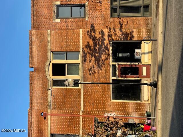 a view of a building with a street