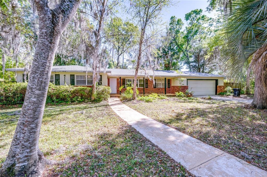 front view of house with a yard