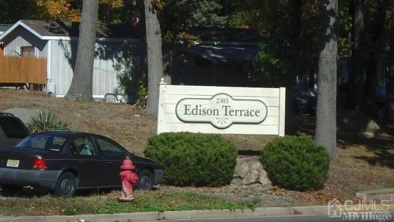 a view of outdoor space with signage and flags