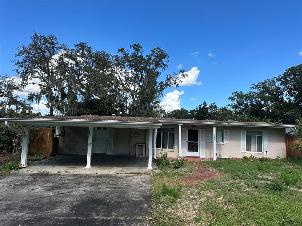 front view of a house with a yard