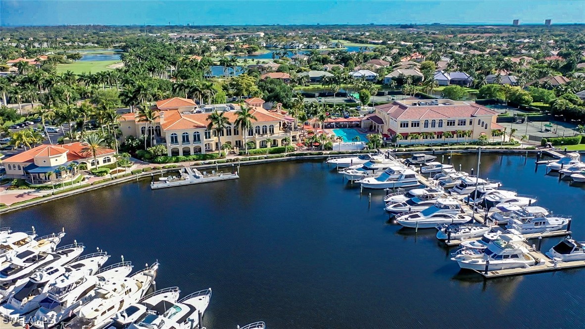 an aerial view of a house with a lake view