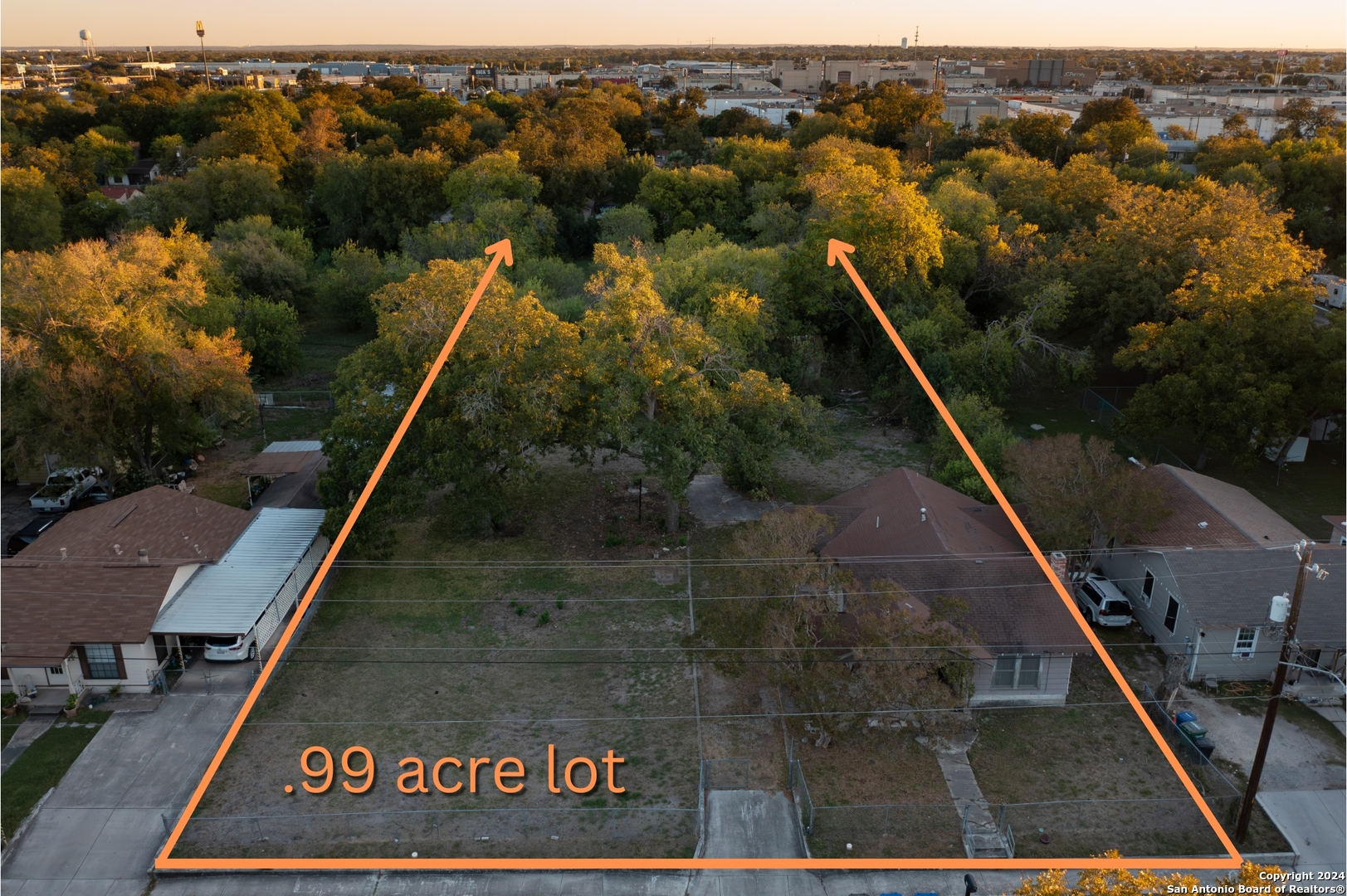 an aerial view of residential house with outdoor space