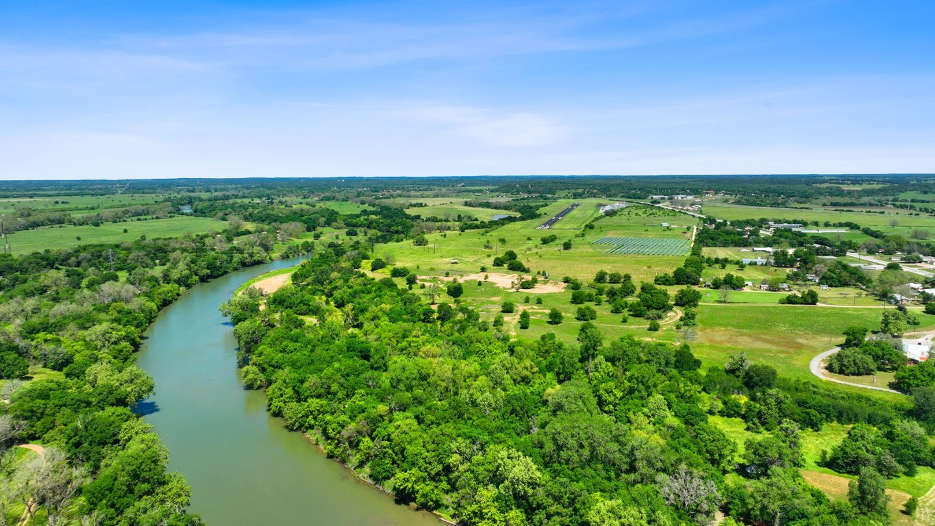 a view of a lake with a city