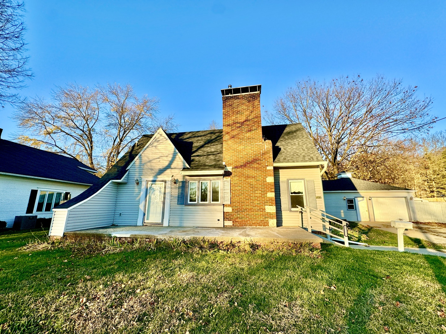 front view of a house with a yard