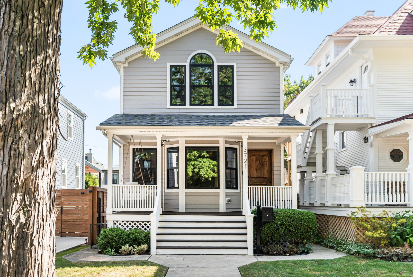 a view of a house with a yard and plants