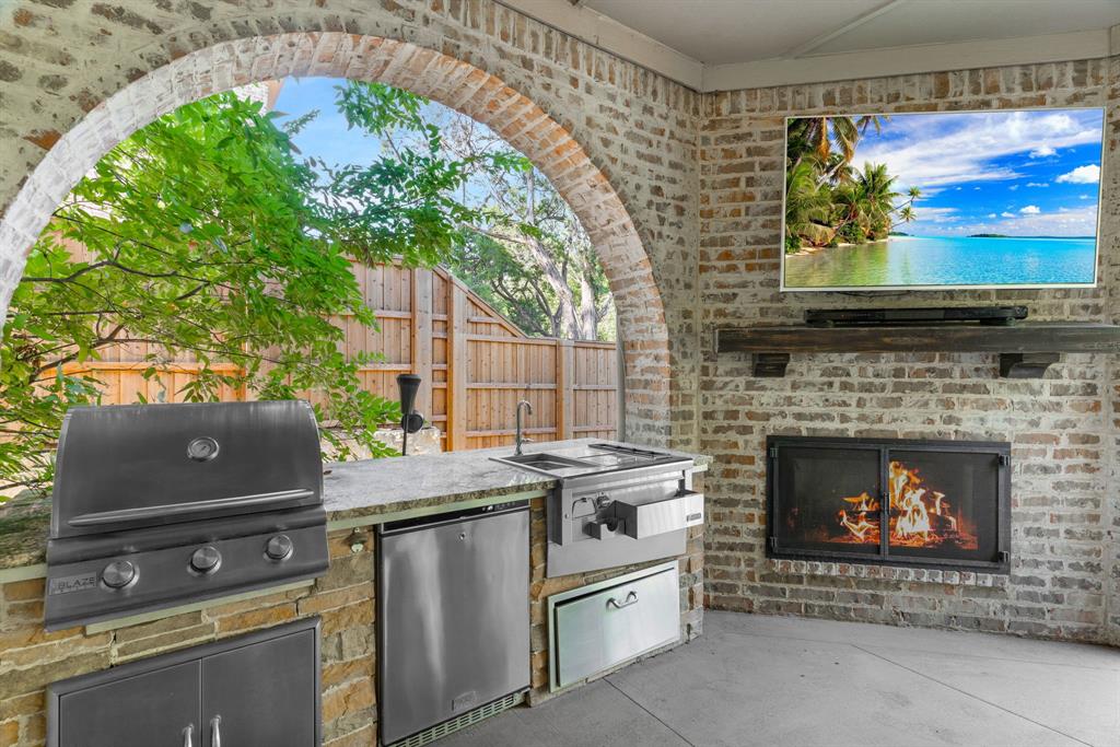 a stove top oven sitting inside of a kitchen