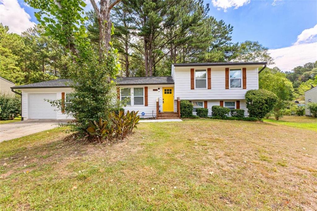 front view of a house with a yard