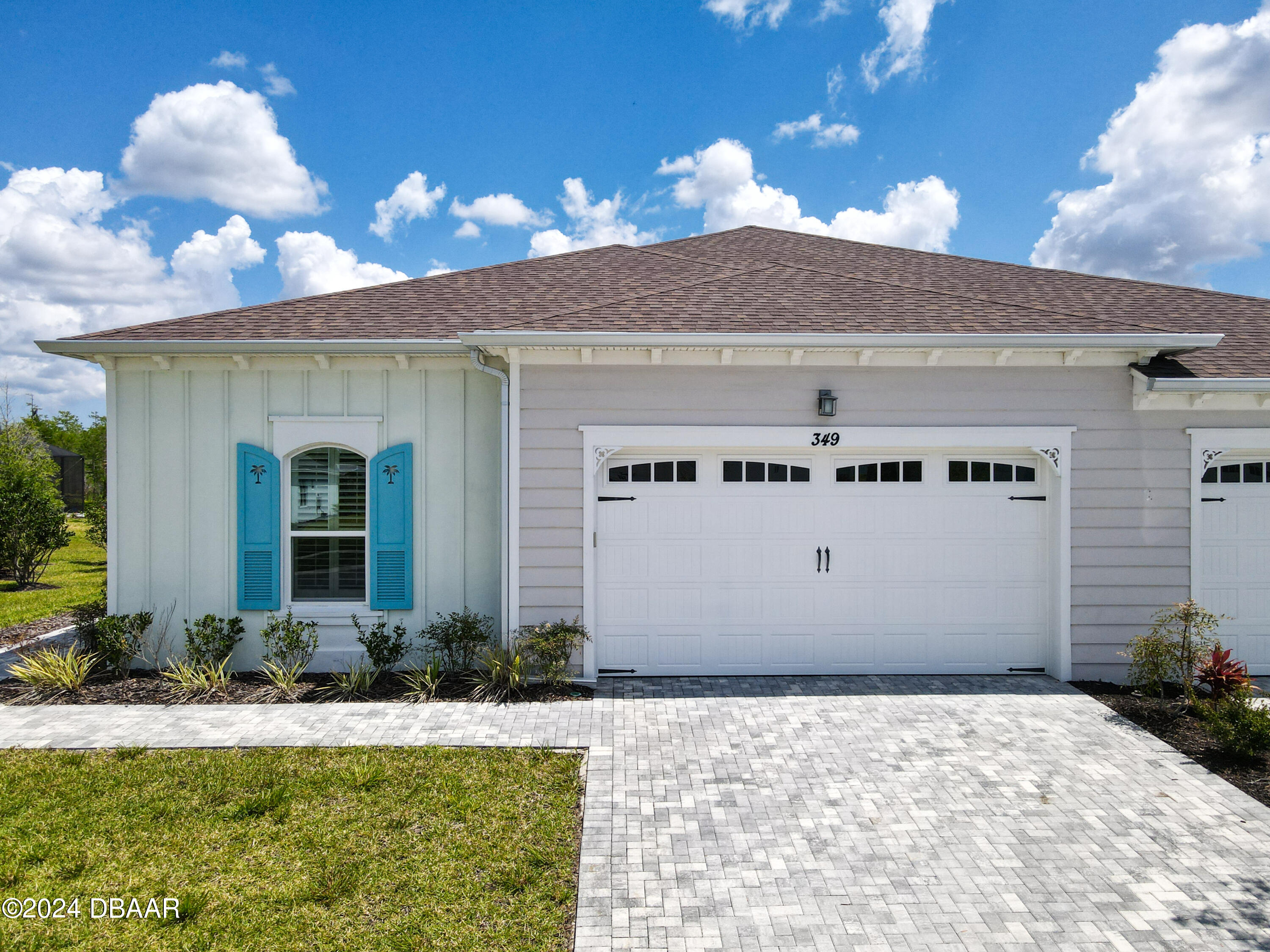 a front view of house with yard