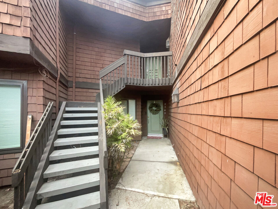 a view of entryway with stairs