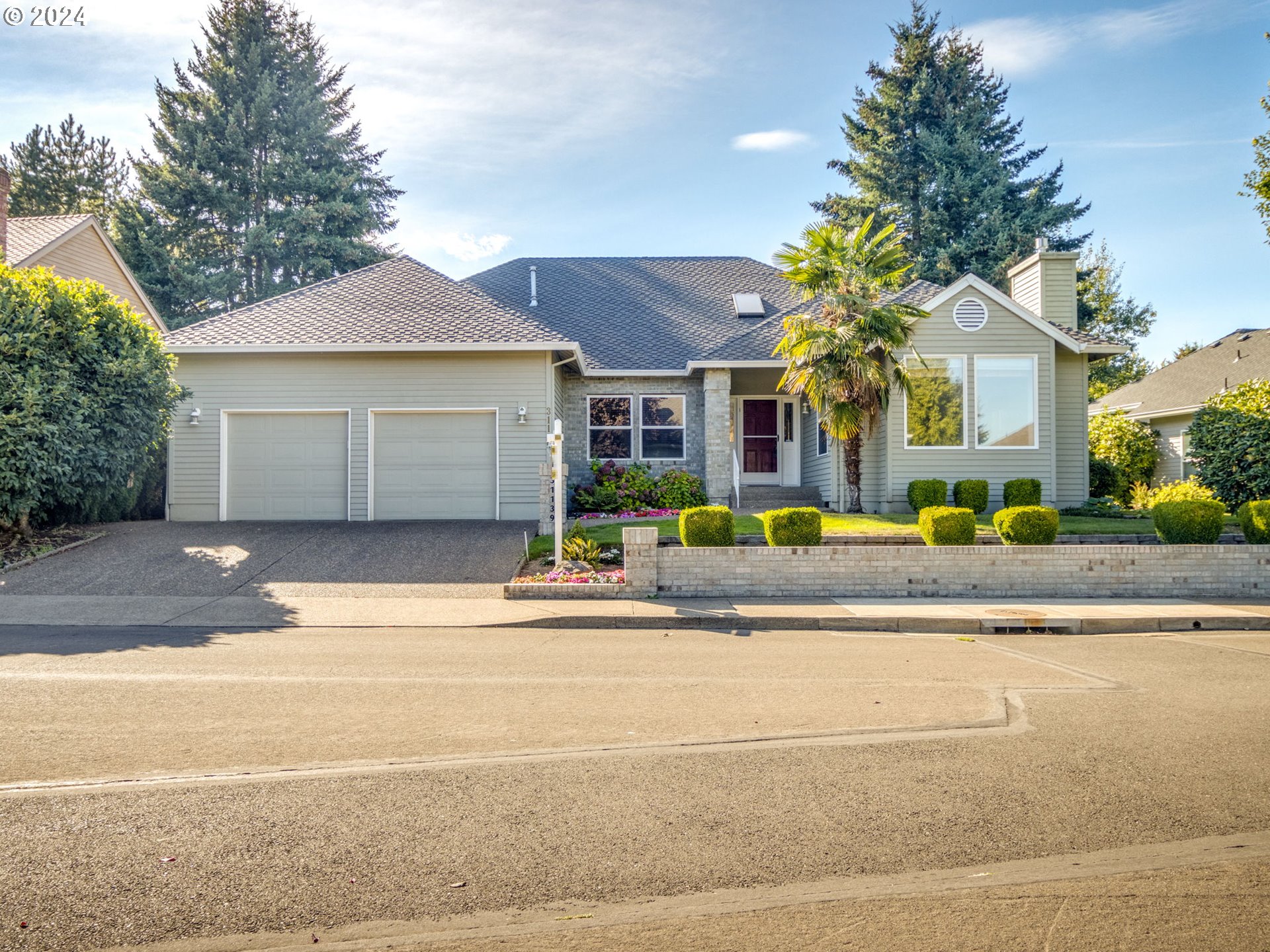 front view of a house with a small yard