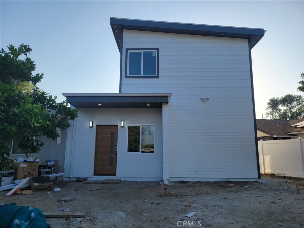 a view of a house with roof deck