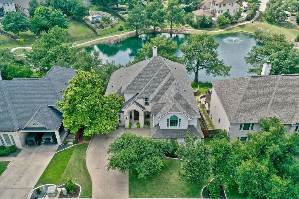 Welcome to 12204 Carlsbad Dr, one of just 17 homes perfectly set in adjacent to the only pond in Lake Pointe.