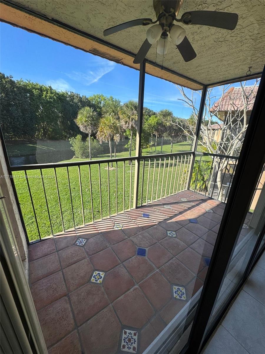 a view of balcony with furniture