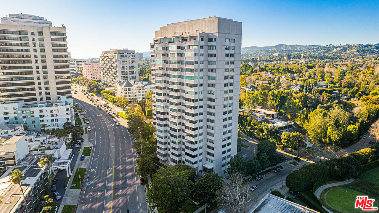 a view of a city with tall buildings