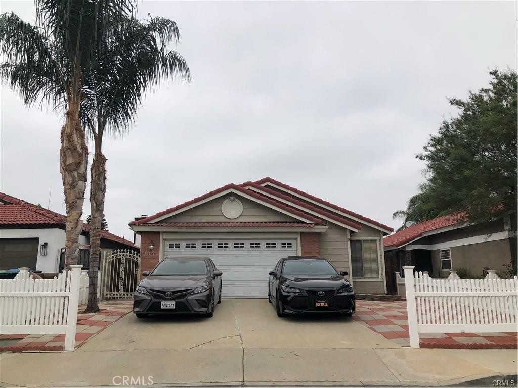 a car parked in front of a house