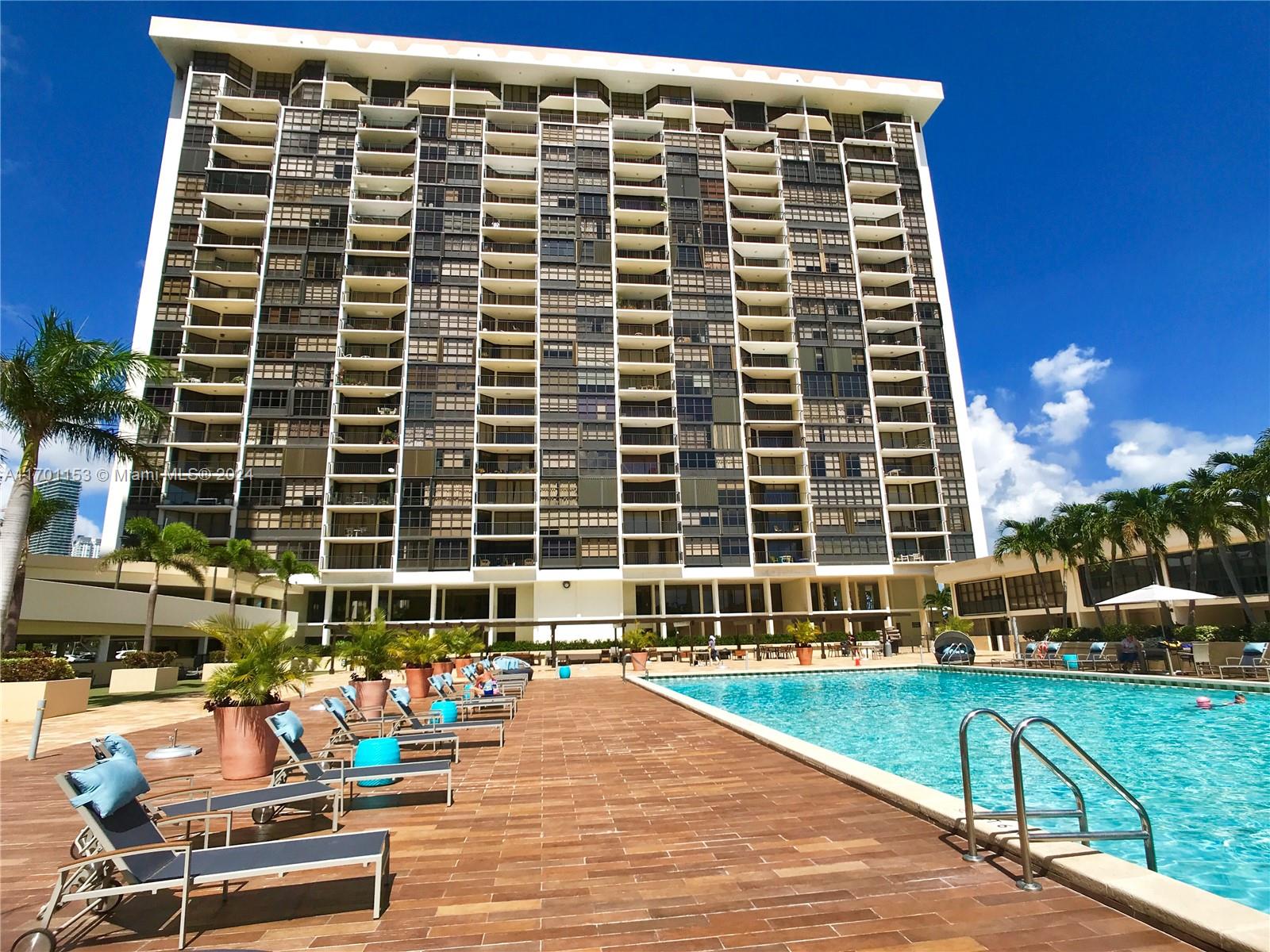 a view of an outdoor space with swimming pool