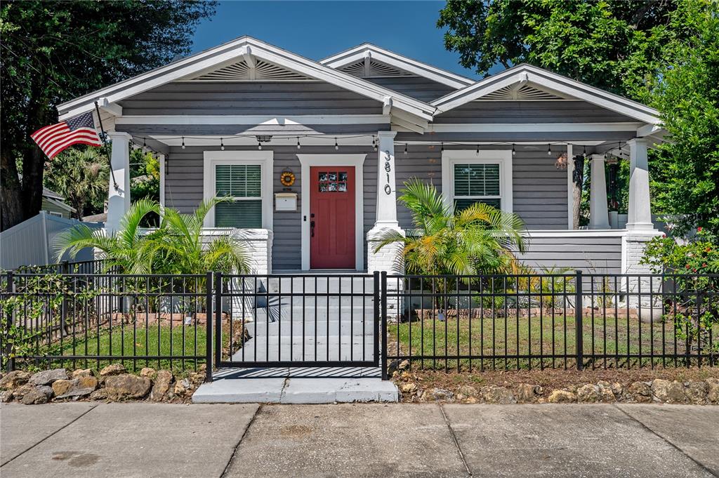 front view of a house with a small garden