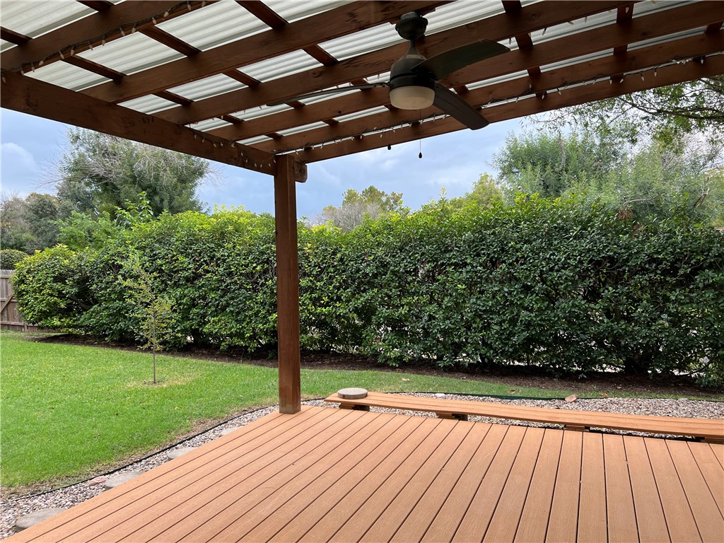 a view of a backyard with hardwood