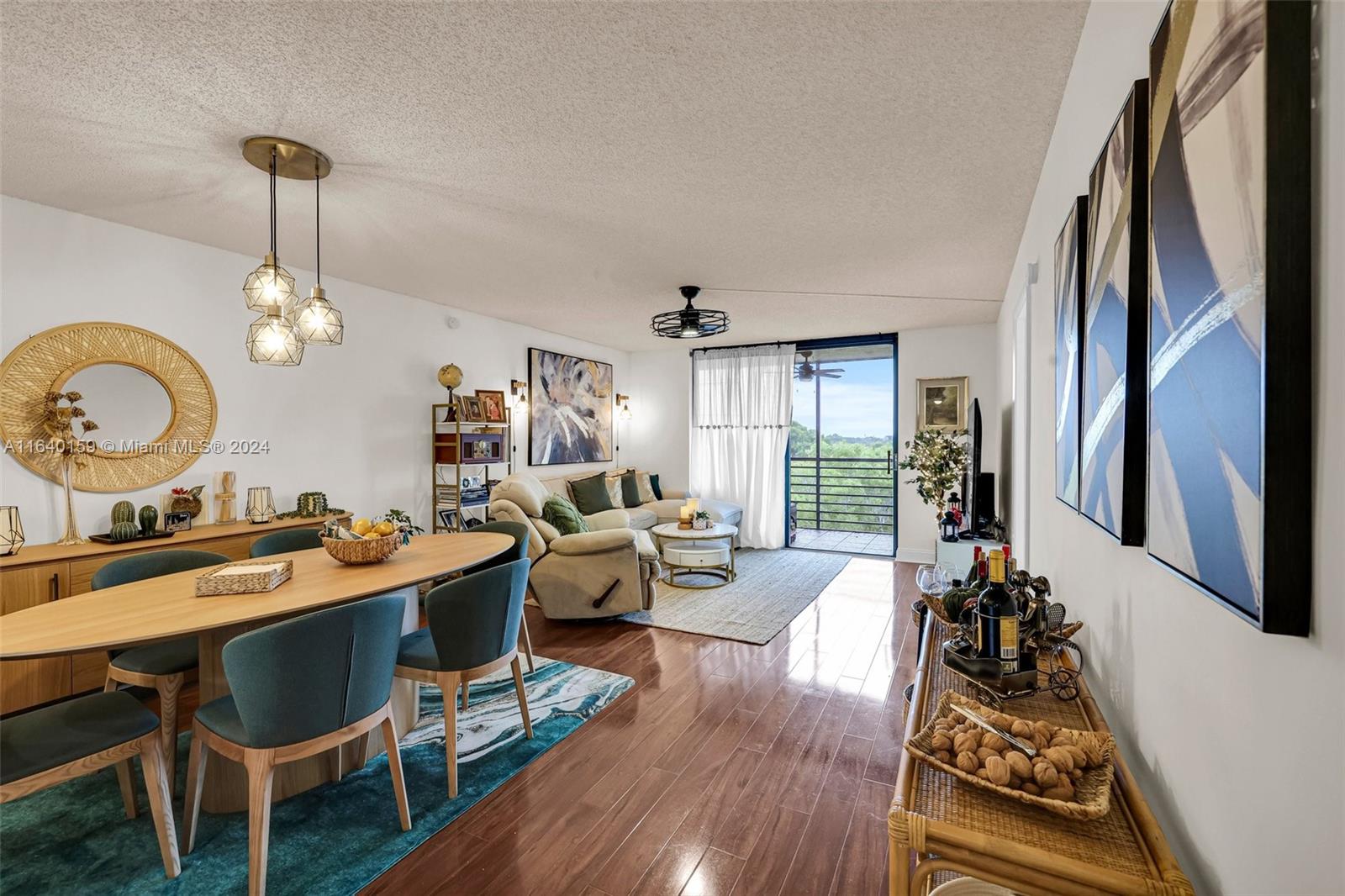 a very nice looking dining room with furniture