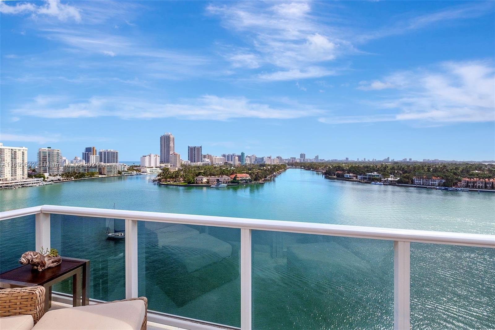 a view of a lake from a balcony