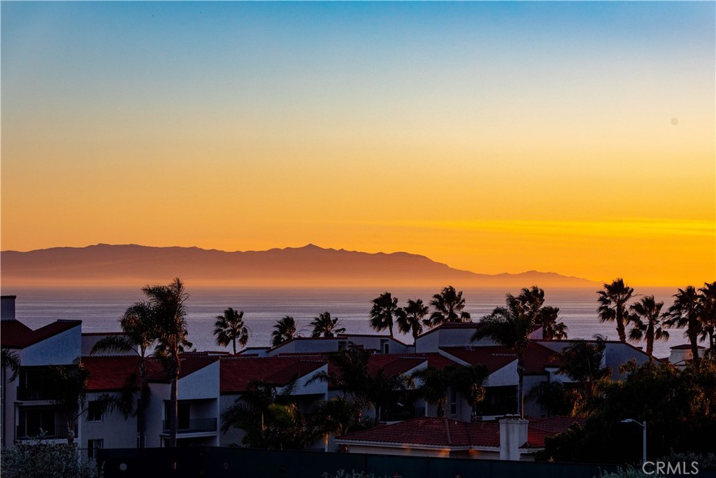 a view of a city with sunset view