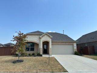 a front view of a house with yard