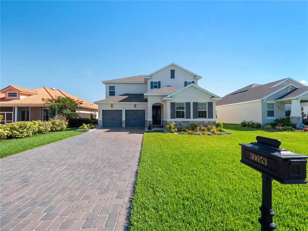 Your new Deer Island home! This 4/3.5 bath, 2 car garage home is located on the Championship Deer Island Golf Course!