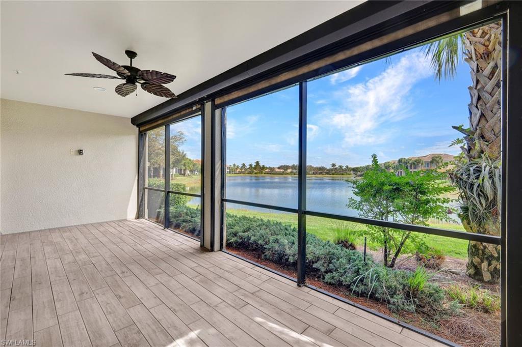 a view of a porch with a floor to ceiling window