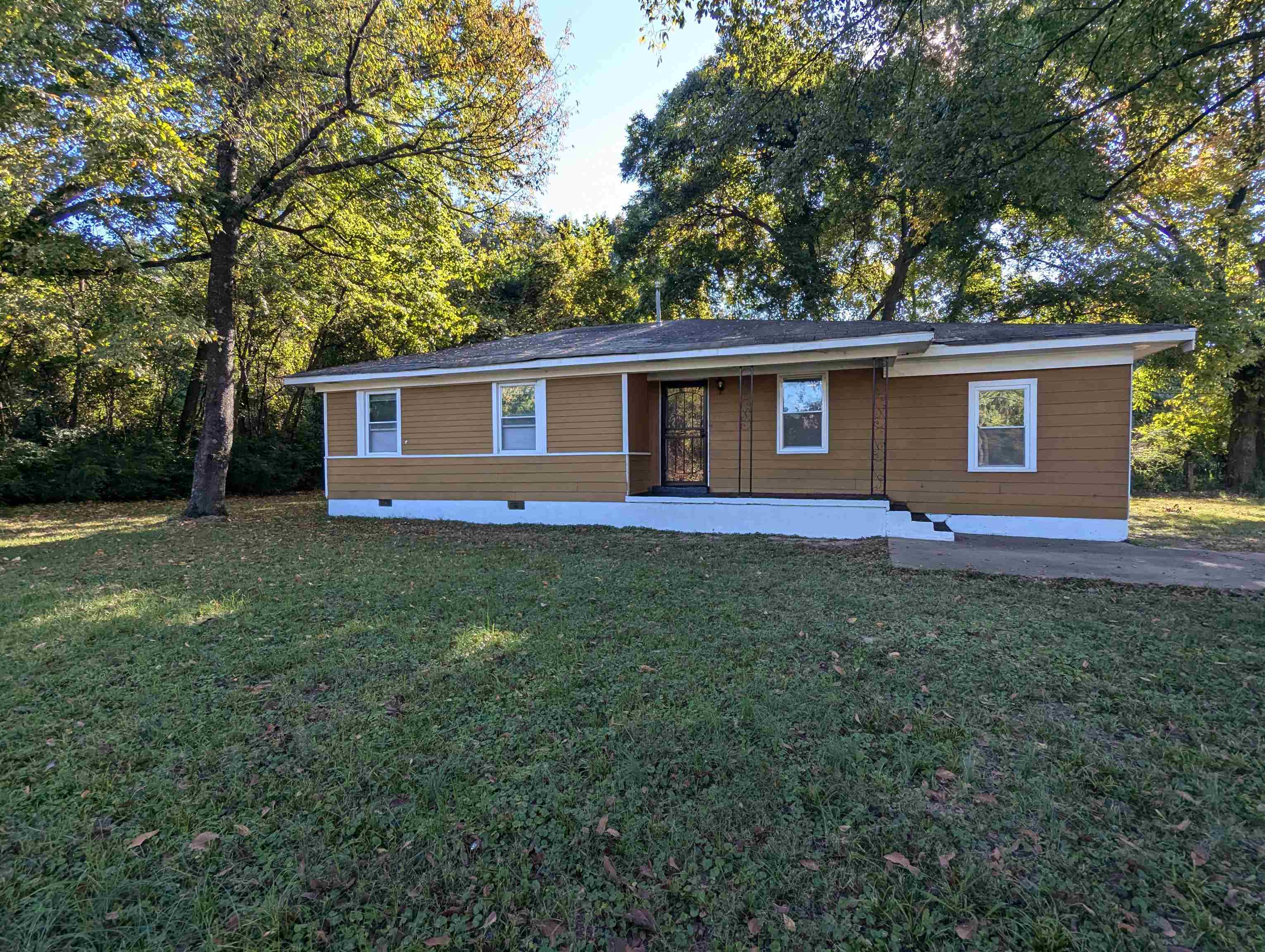 front view of house with a yard