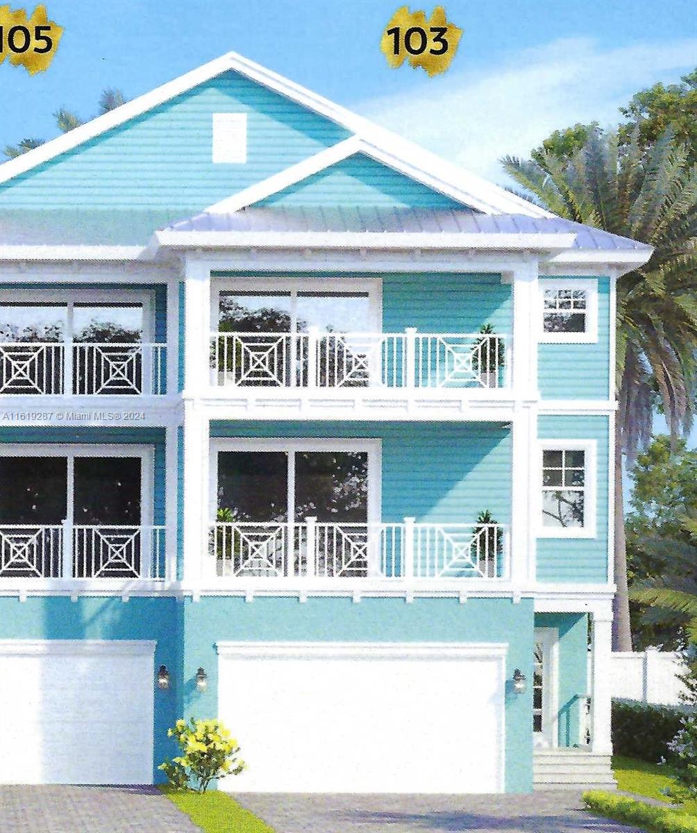 a front view of a house with glass windows