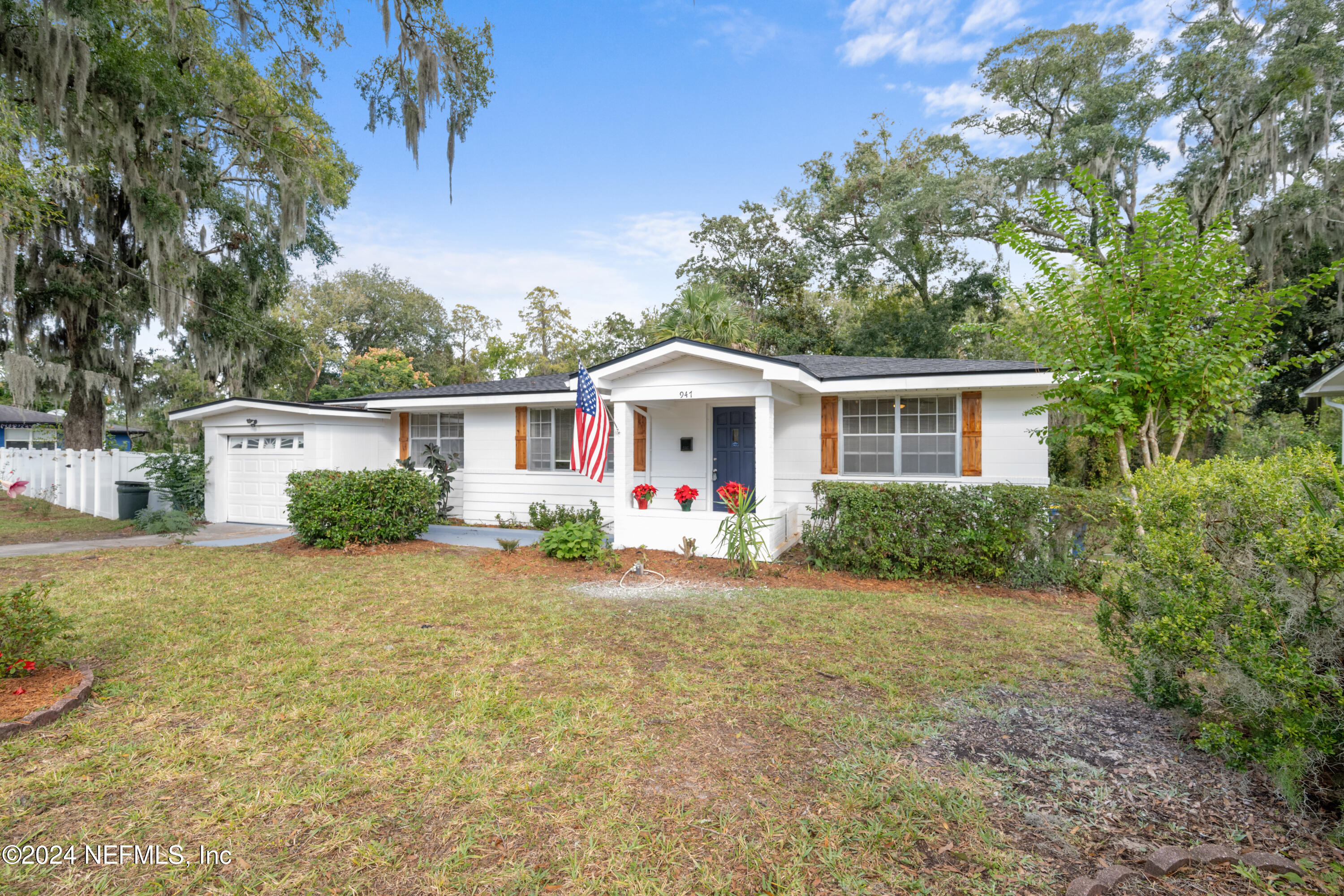 front view of a house with a yard