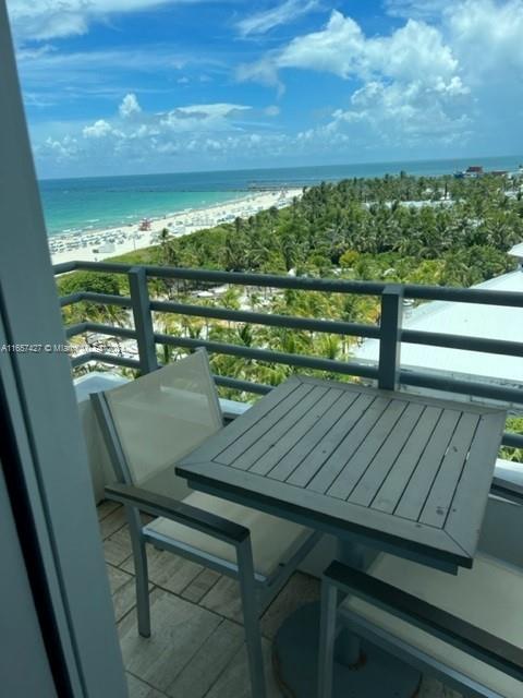 a view of a balcony with an outdoor space