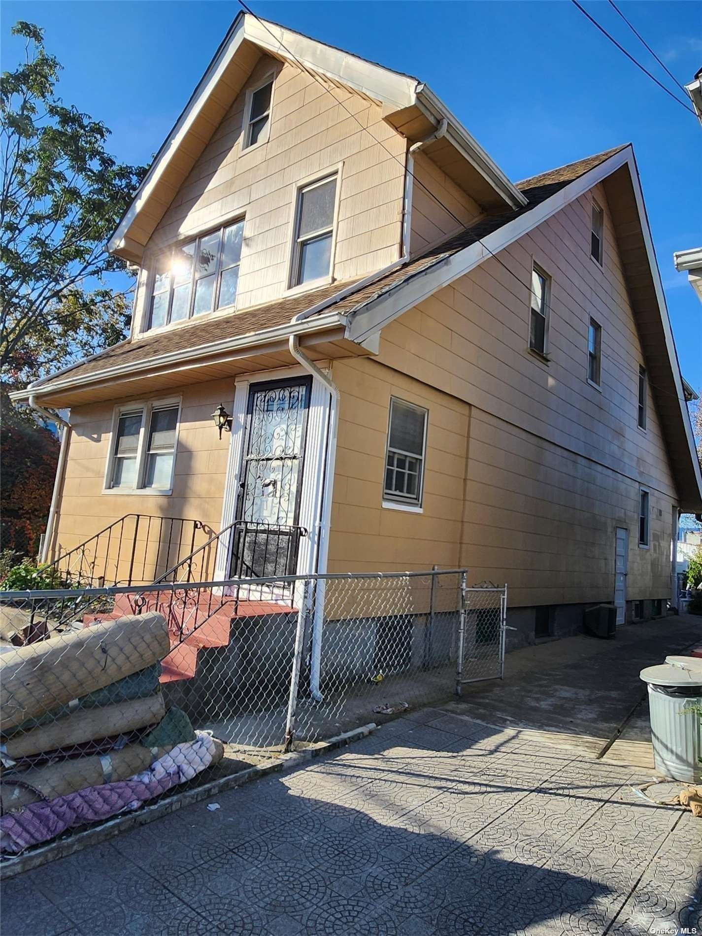 a front view of a house with a garage