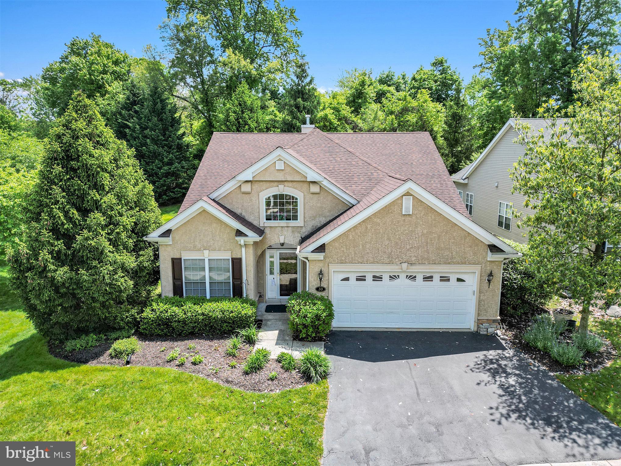 a aerial view of a house with a yard