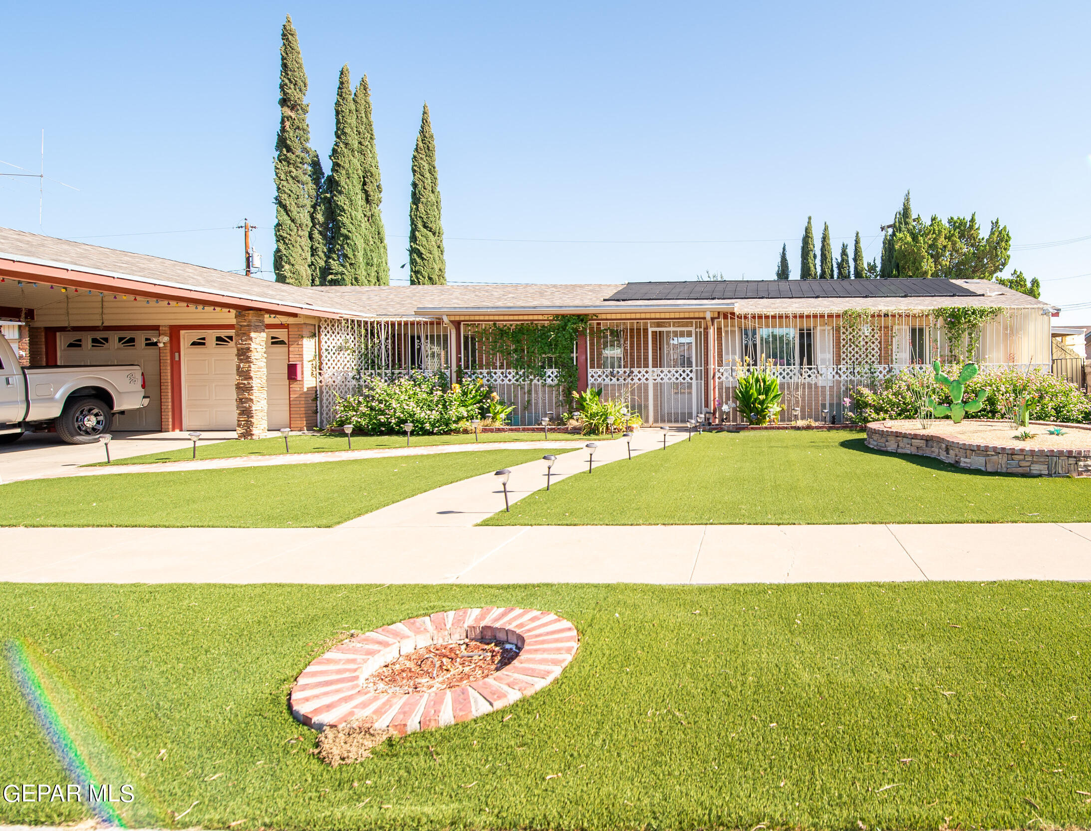 a view of a house with a big yard