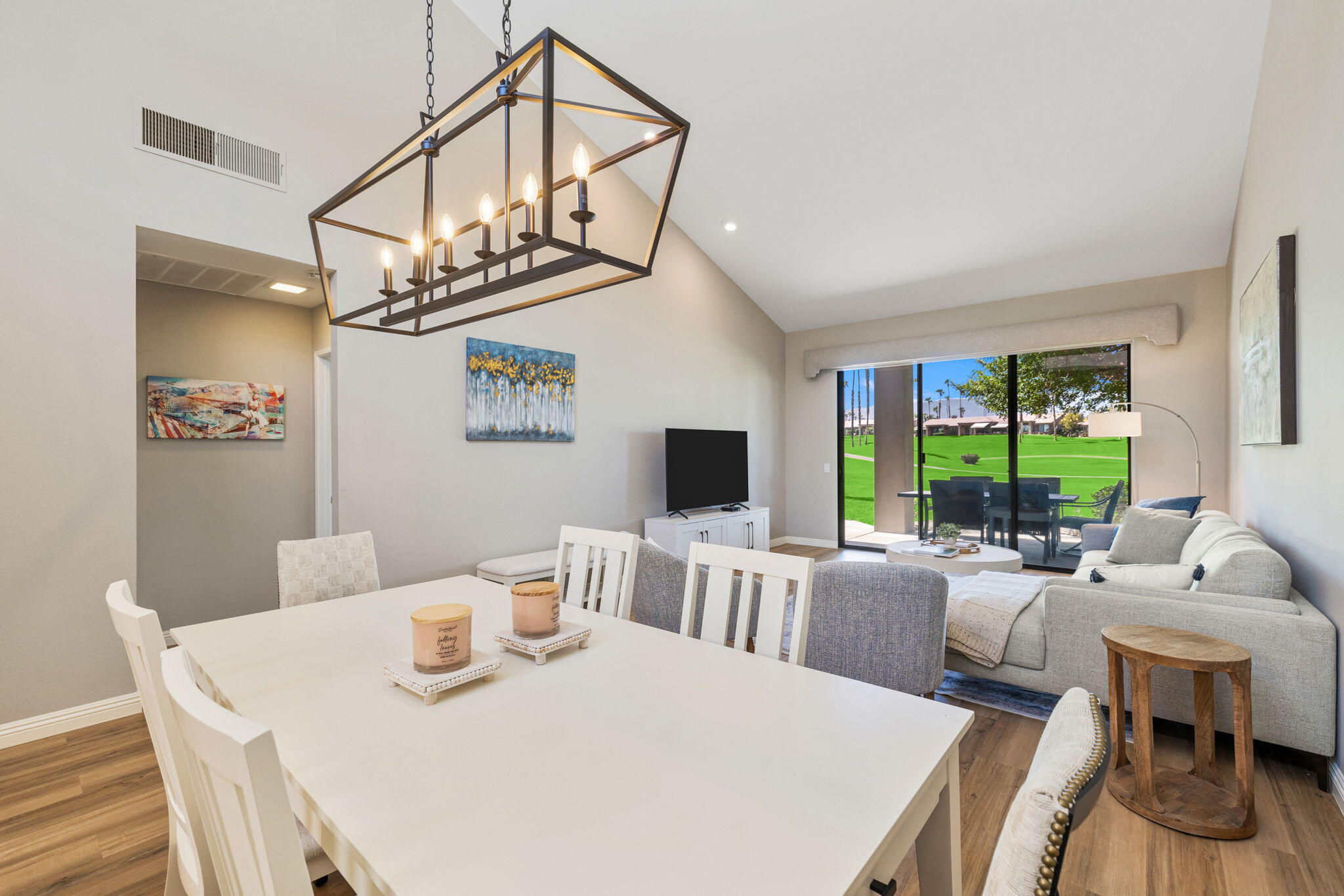 a view of a dining room with furniture window and outside view