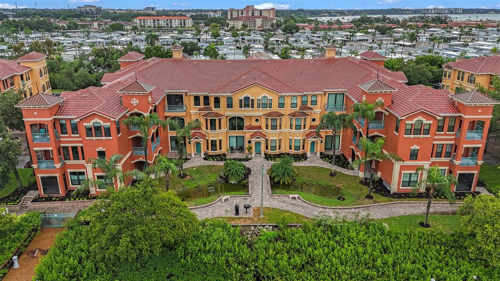 an aerial view of residential houses and outdoor space