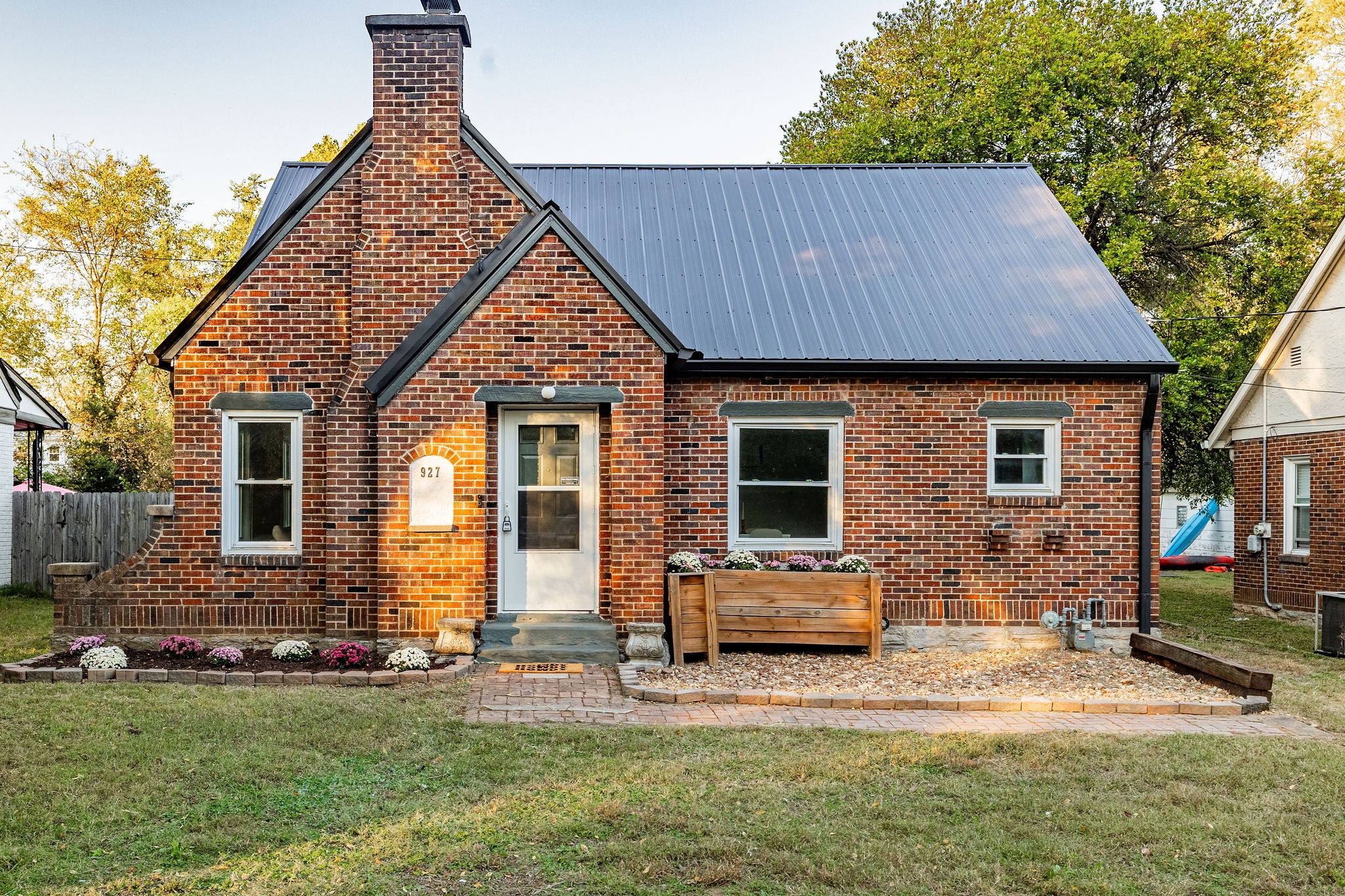 front view of a house with a yard