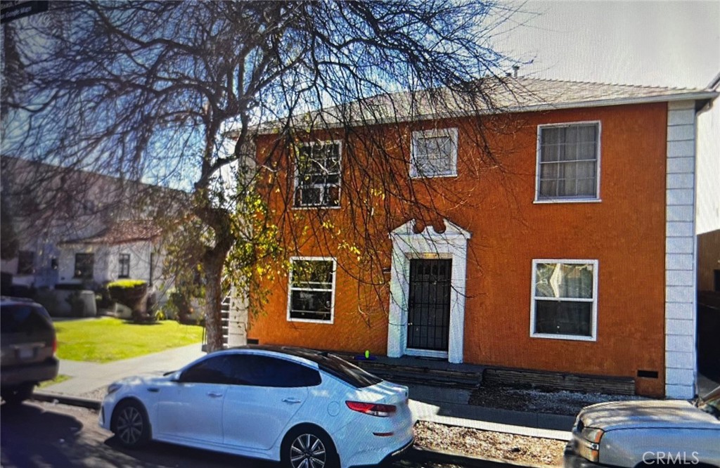 a car parked in front of a house