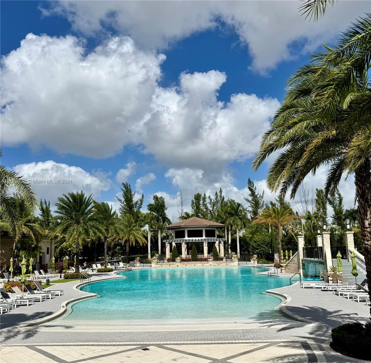 a view of a swimming pool with a garden