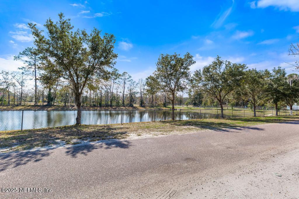 a view of a lake view with a yard