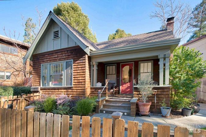 a view of house with outdoor seating space