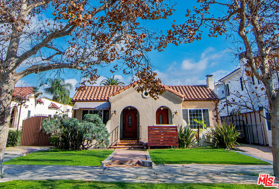 front view of a house with a yard