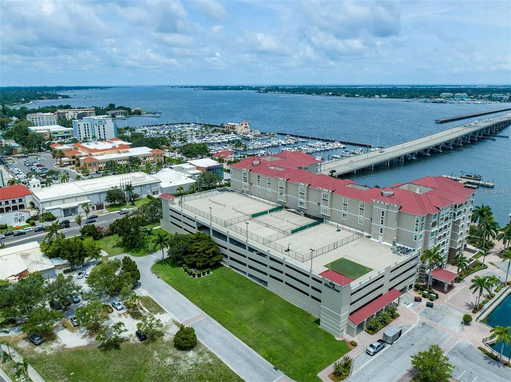 an aerial view of residential houses and outdoor space