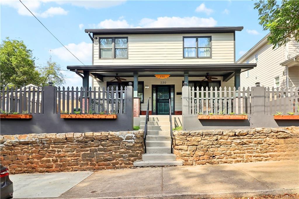 a front view of a house with a balcony