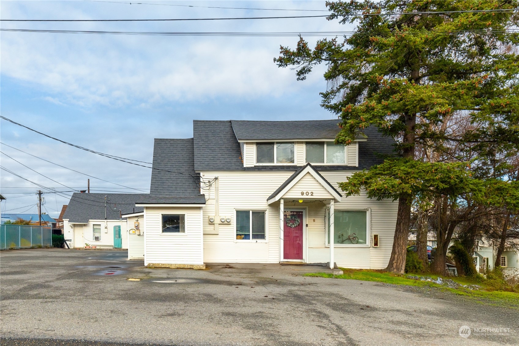 a front view of a house with a garage