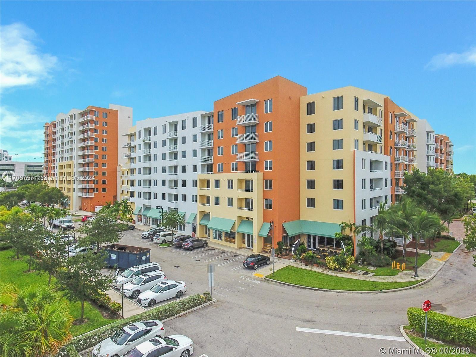 a view of a tall building from a patio