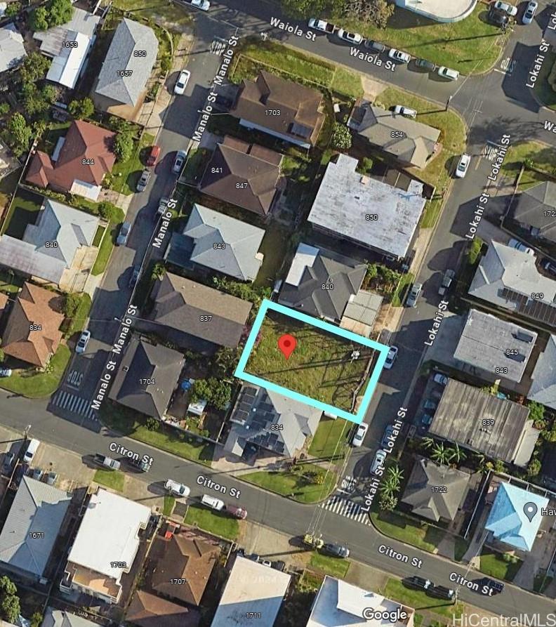 an aerial view of a building with outdoor space